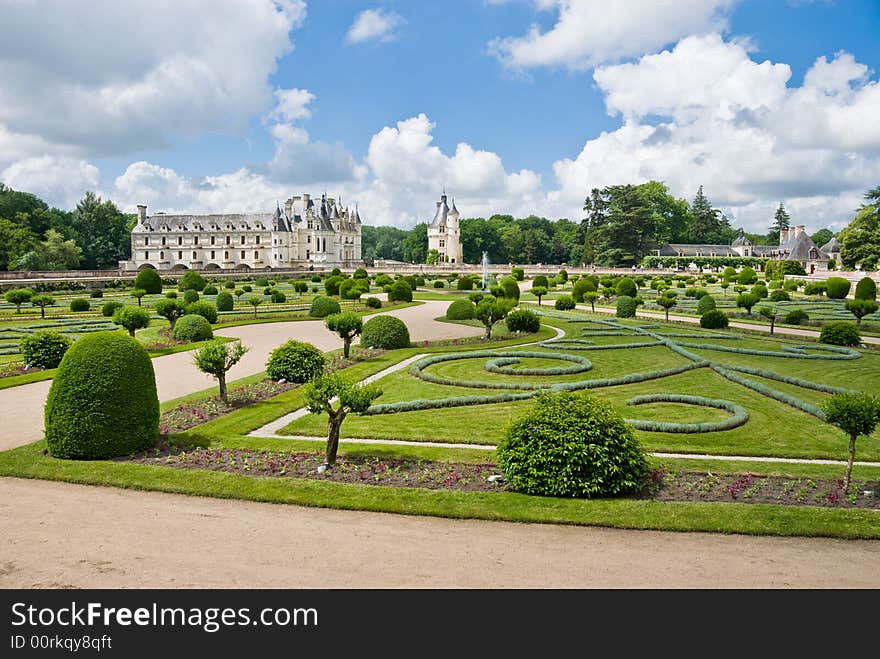 Famous castle Chenonceau, view from the garden. Loire Valley, France. Famous castle Chenonceau, view from the garden. Loire Valley, France.