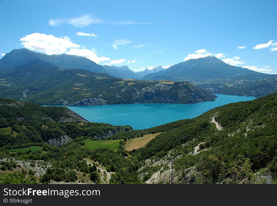 Serre-Poncon Lake, beneath the mountains of the Hautes-Alpes and the northern edge of the Alpes de Haute Provence, is the biggest artificial lake in Europe. One of its main caracteristic is its amazing blue color inherited from the water of Durance River. Serre-Poncon Lake, beneath the mountains of the Hautes-Alpes and the northern edge of the Alpes de Haute Provence, is the biggest artificial lake in Europe. One of its main caracteristic is its amazing blue color inherited from the water of Durance River.