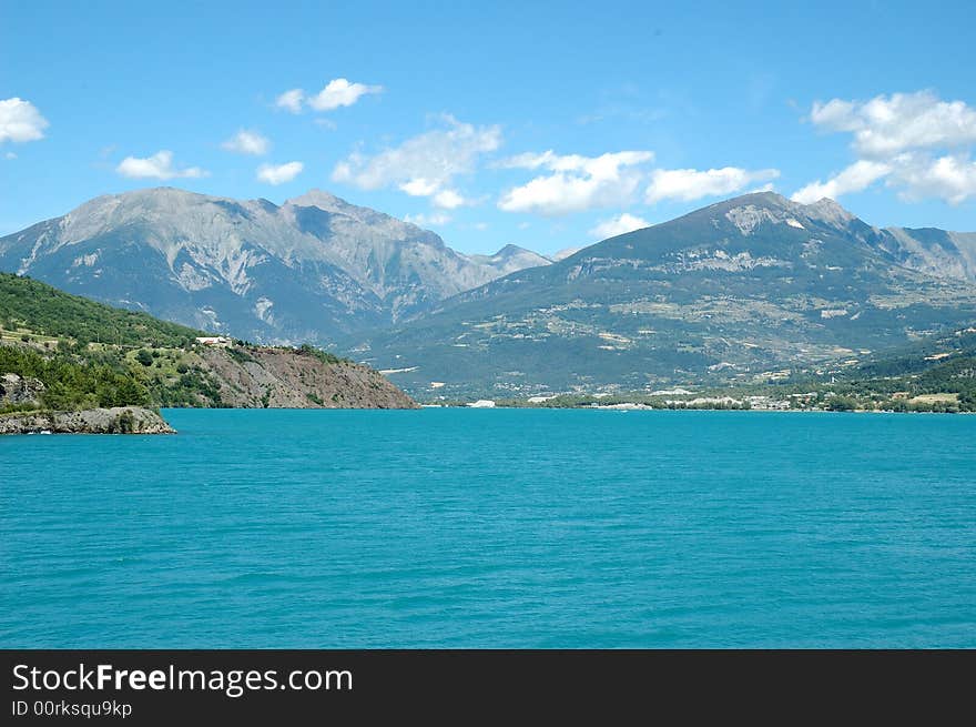 Serre-Poncon Lake, beneath the mountains of the Hautes-Alpes and the northern edge of the Alpes de Haute Provence, is the biggest artificial lake in Europe. One of its main caracteristic is its amazing blue color inherited from the water of Durance River. Serre-Poncon Lake, beneath the mountains of the Hautes-Alpes and the northern edge of the Alpes de Haute Provence, is the biggest artificial lake in Europe. One of its main caracteristic is its amazing blue color inherited from the water of Durance River.