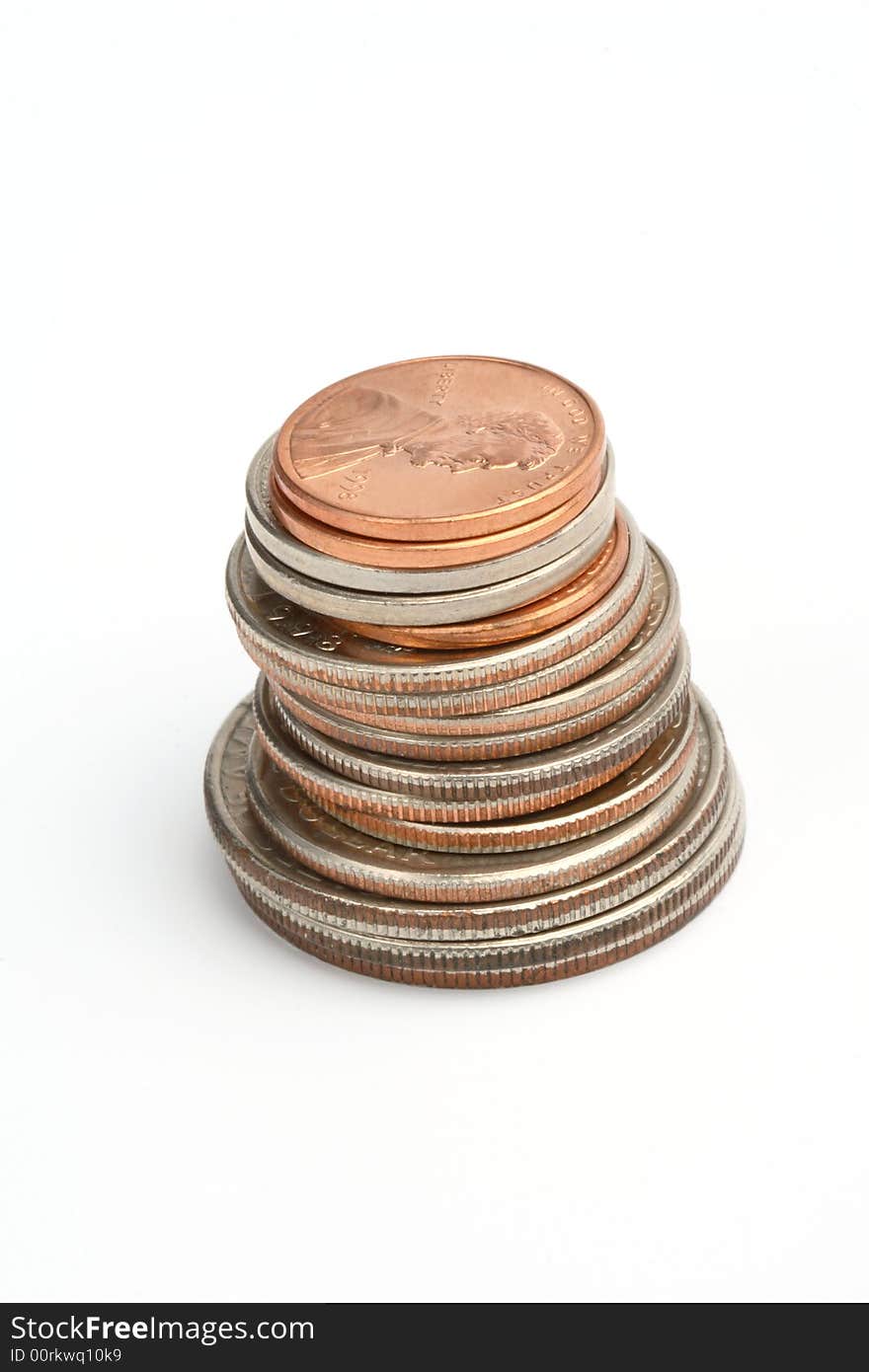 A pile of dollar coins on a white