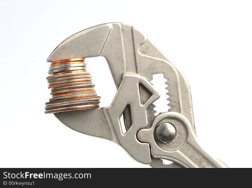 Pliers with some coins