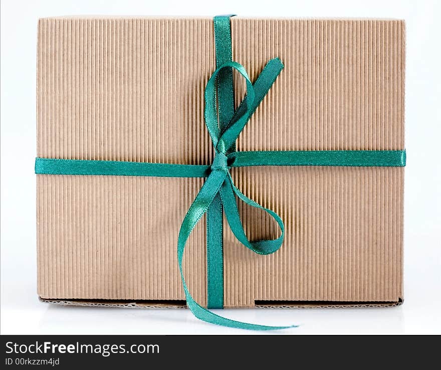 Easy to isolate closed paper box with green ribbon