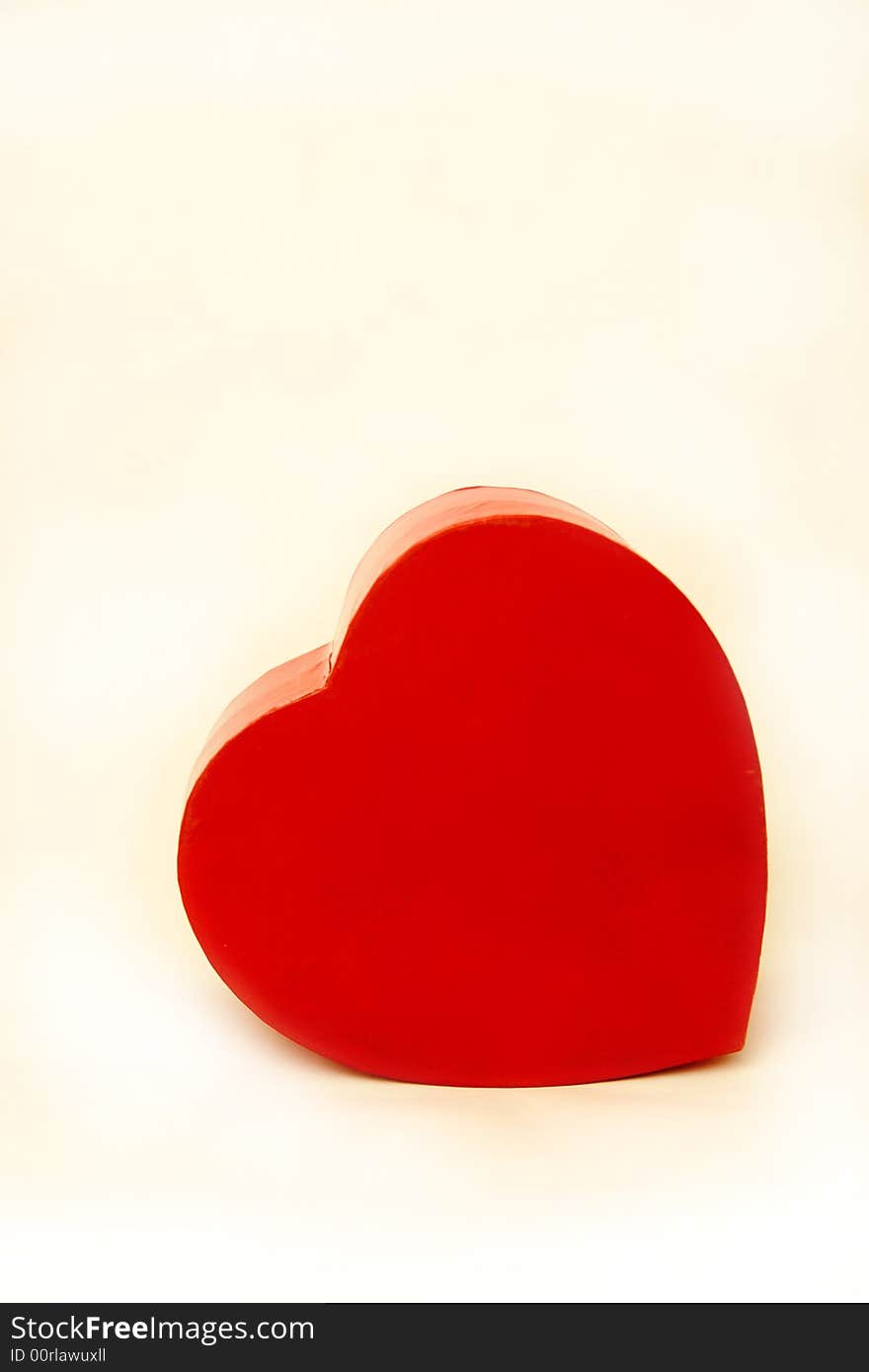 Red heart shaped box on an isolated white background