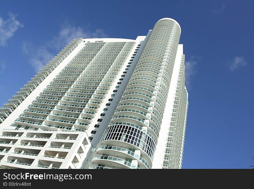 Abstract Building shot from below displaying brilliant blue sky.