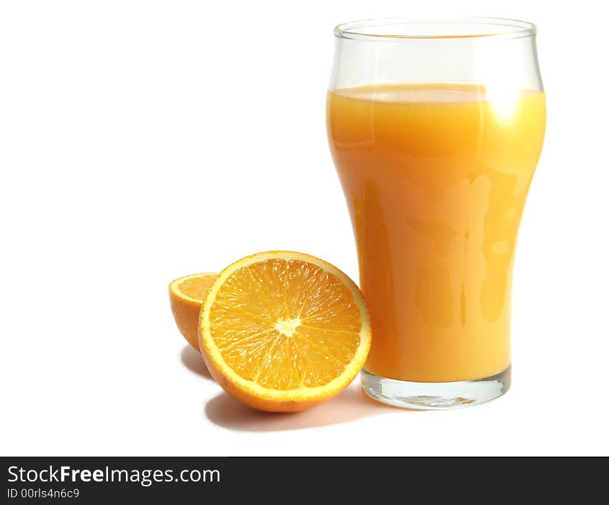 Oranges and glass of orange juice isolated on a white background