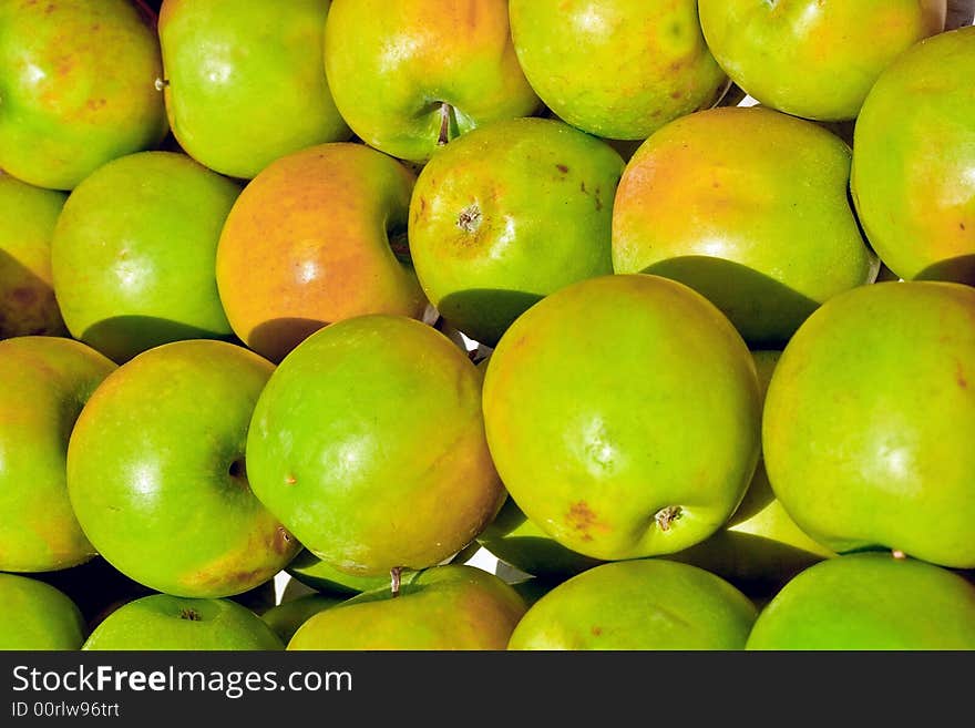 A basket of fresh organic Granny Smith apples