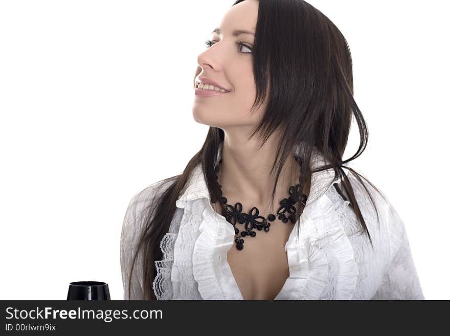 Beautiful lady with black tall glass staring up over white. Beautiful lady with black tall glass staring up over white