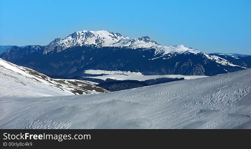 Ciucas mountain, seen from a distance of 25 kilometers (Baiul Mare mountain)