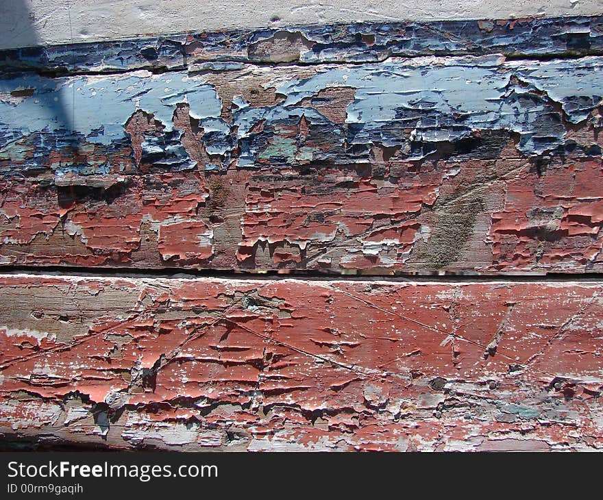 Red And Blue Cracked And Peeling Paint