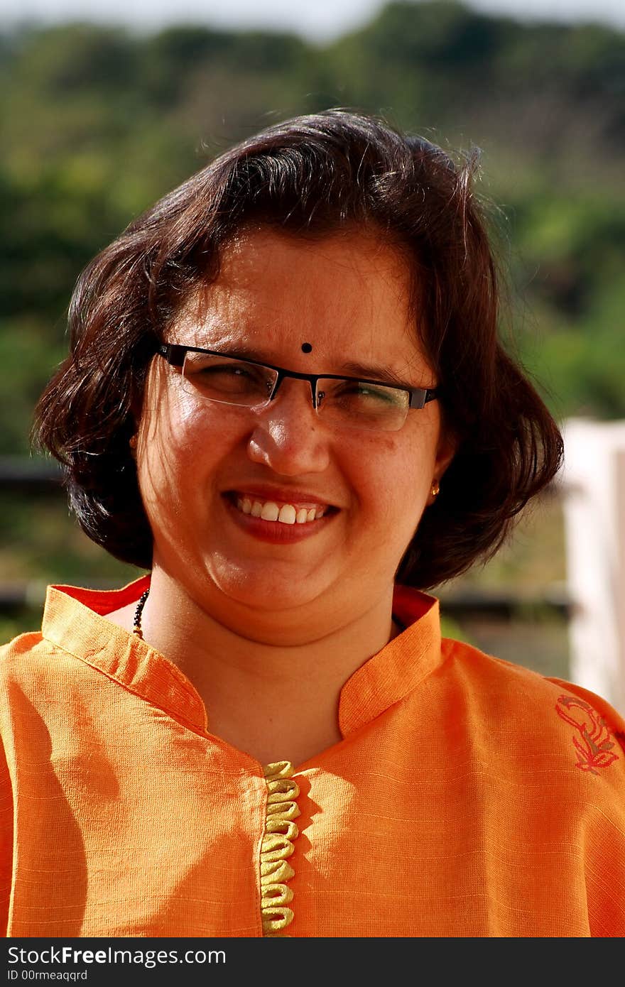 A woman having nice and studious face of a scholar.