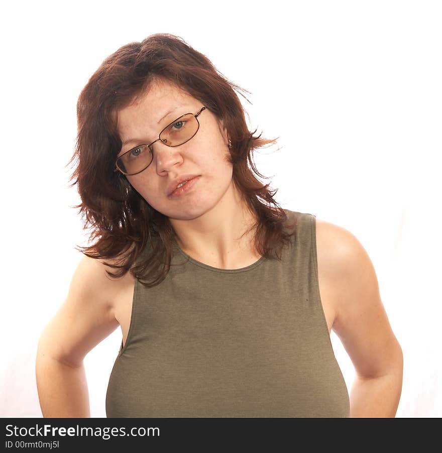 Portrait of the woman in a fitting vest on a white background.