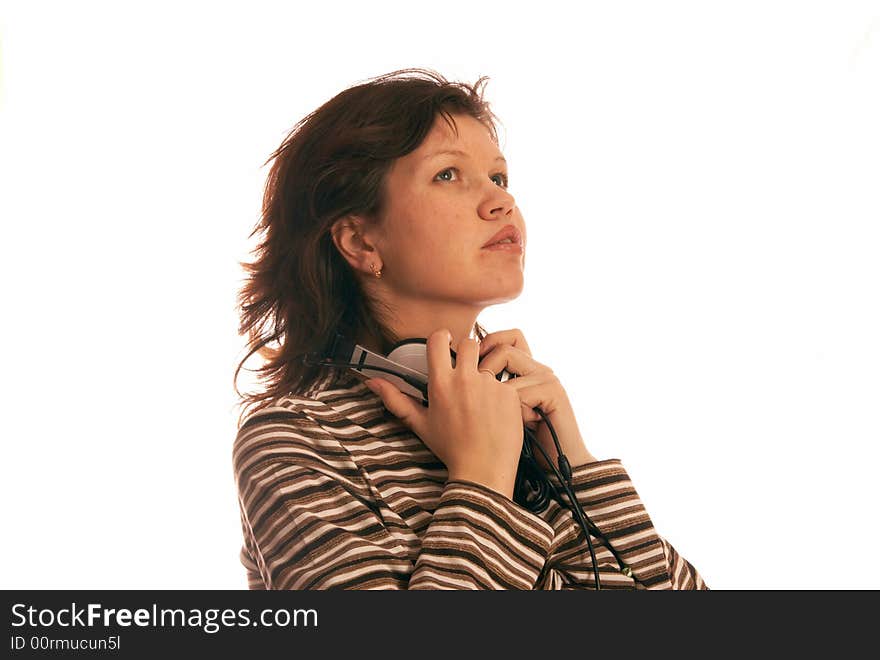 The musical girl with headphones, on a white background