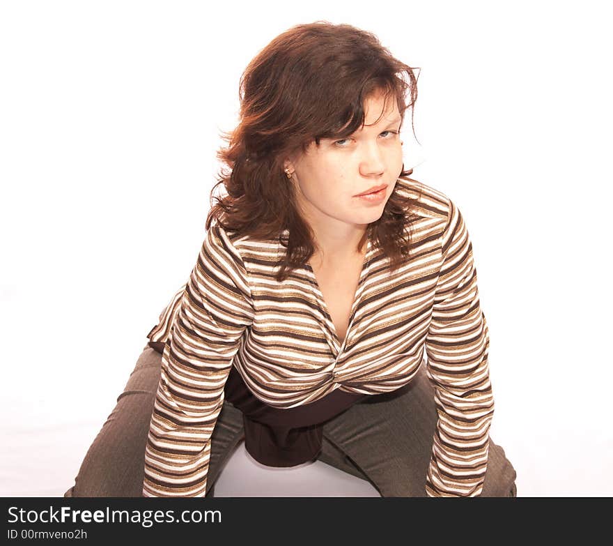 The girl in a striped jacket on a white background