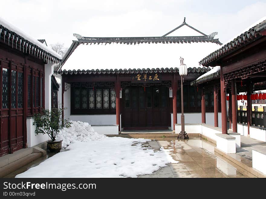 The beautiful and enjoyable snow scenery in the winter in the southern part of China. These sceneries are famous for their snow ,water, houses,and the blue sky.They are typical of the south in China.This picture is taken in the place of interest“Mooring by the Feng Bridge at night” in Suzhou ,China.