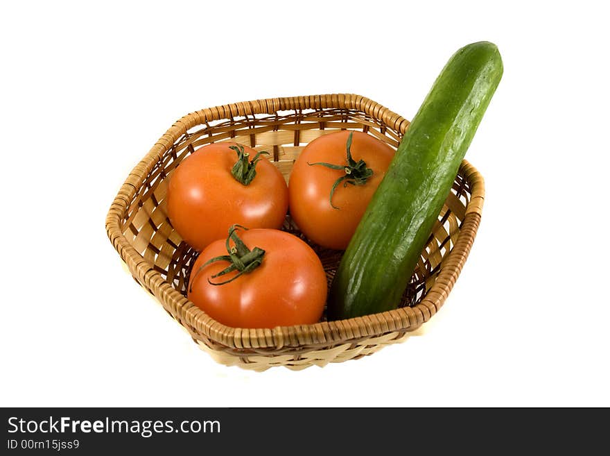 Basket With Tomatoes And Cucumber