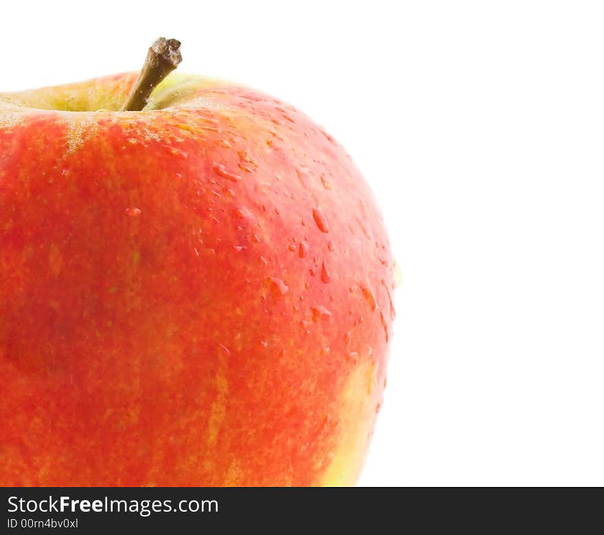 Red apple with water droplets on it