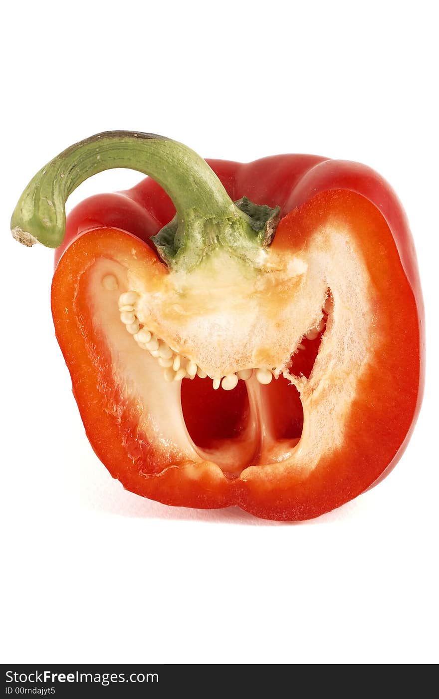 Half red pepper on white background