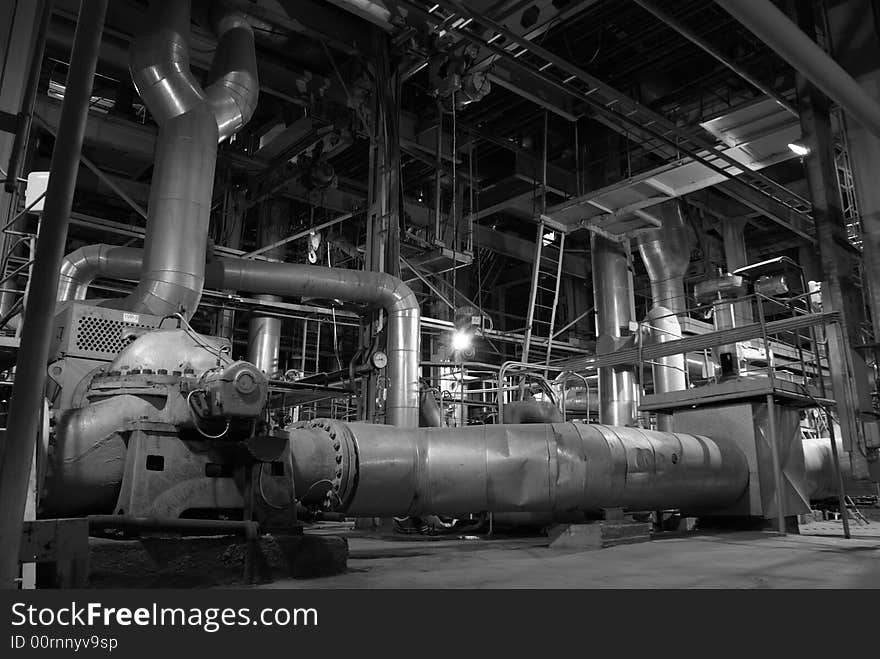 Different size and shaped pipes at a power plant. Different size and shaped pipes at a power plant