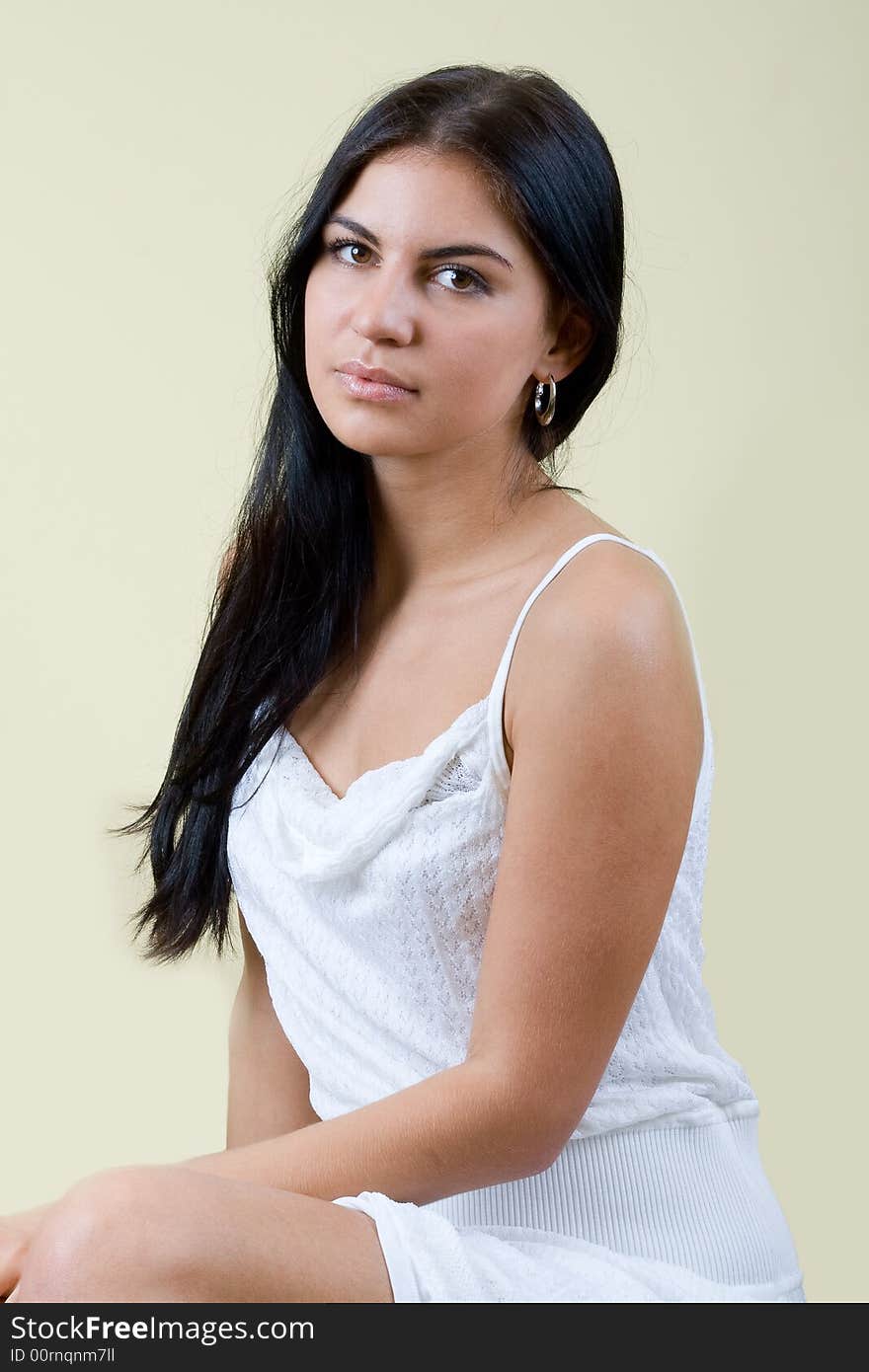 Black hair young woman portrait. studio shot.