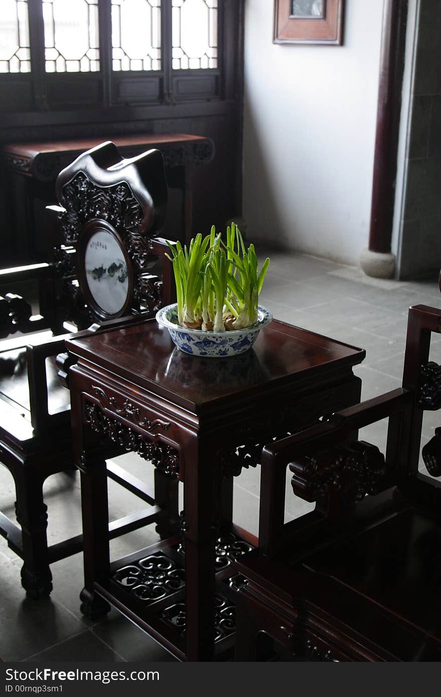 An ancient and graceful sitting room with mooden furniture.This picture is taken in the place of interest“Mooring by the Feng Bridge at night” in Suzhou ,China.