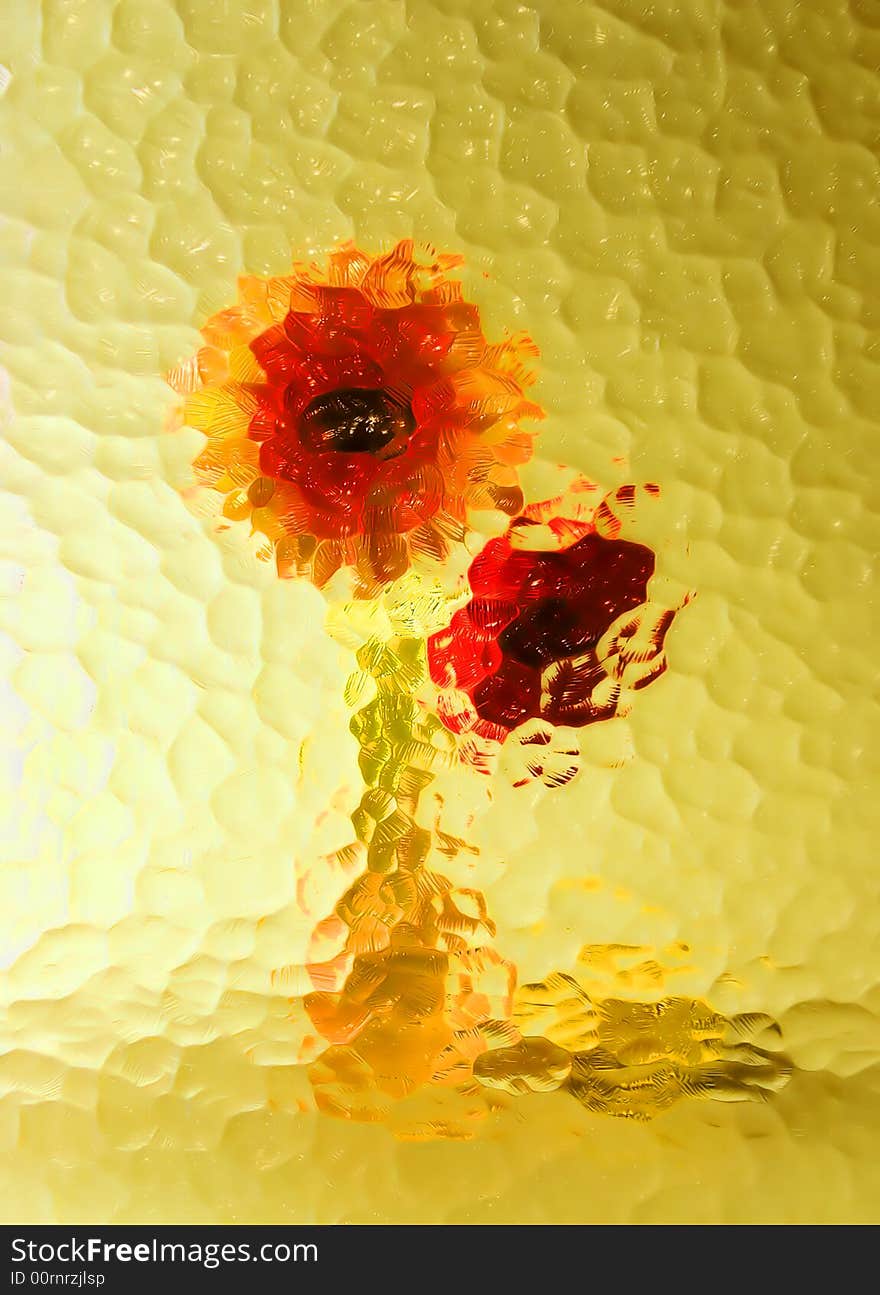 Red unflowers through corrugated glass. Red unflowers through corrugated glass