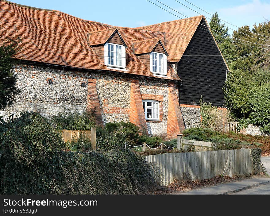 Traditional Brick and Flint Enlish Rural House and Garden. Traditional Brick and Flint Enlish Rural House and Garden