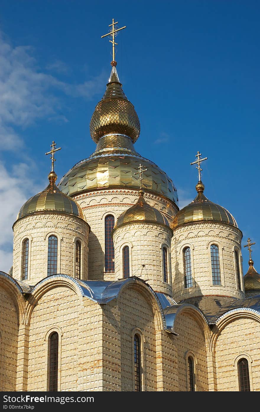 Golden domes and crosses over russian or ukrainian church