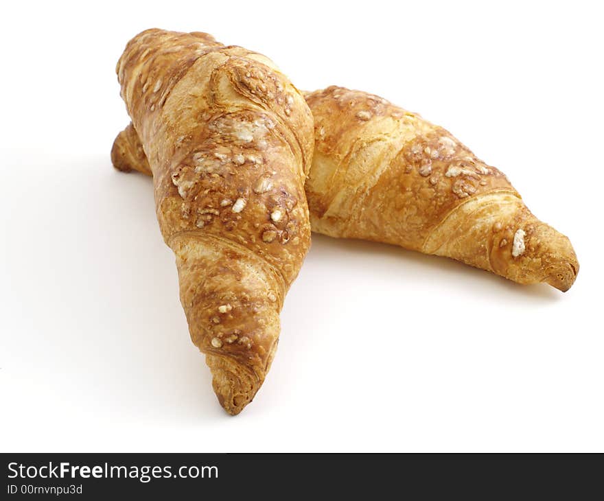 Two croissants isolated on white background