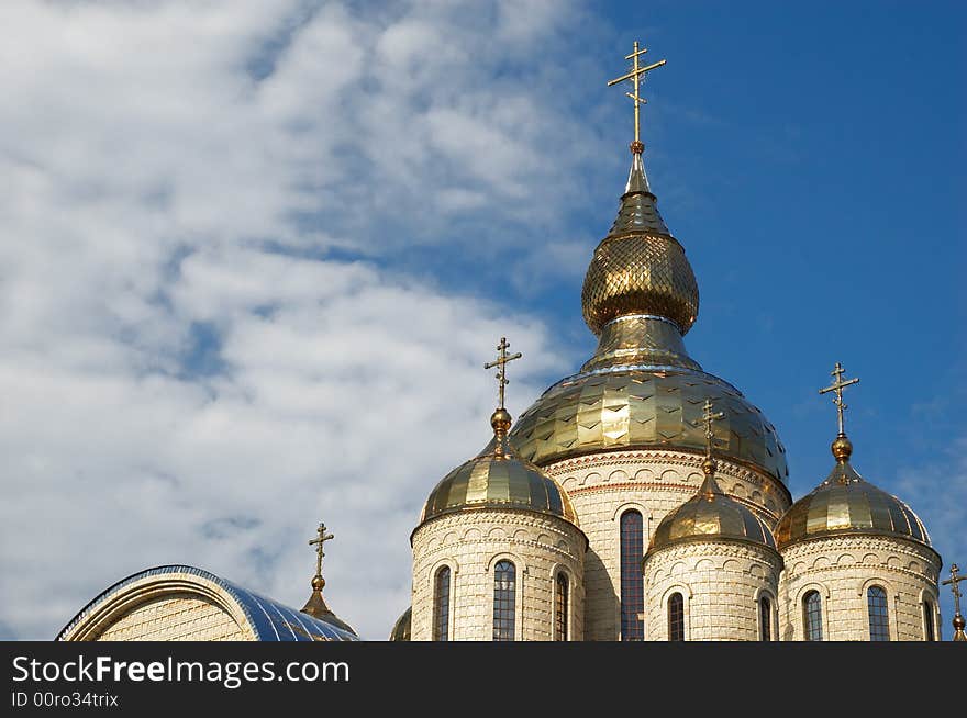 Golden domes and crosses over russian or ukrainian church