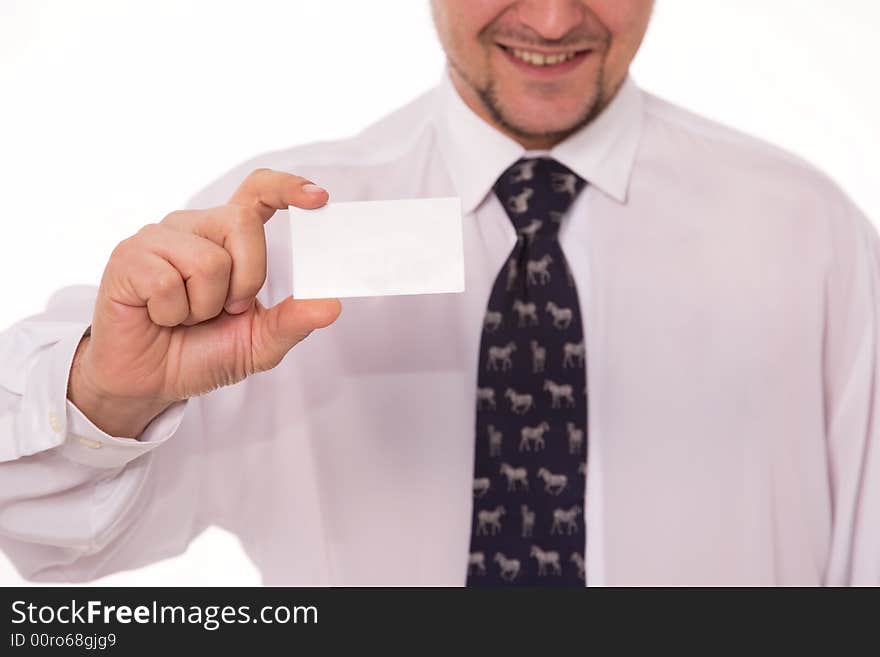 Well-dressed businessman holding an empty business card. Well-dressed businessman holding an empty business card