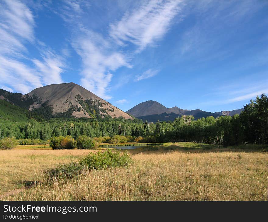 Warner Lake and surrounding mountains and meadow in the La Sal mountains near Moab, Utah