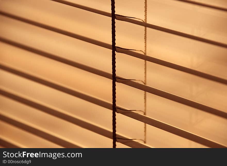 Detail image of metal blinds on a sunny day. Detail image of metal blinds on a sunny day