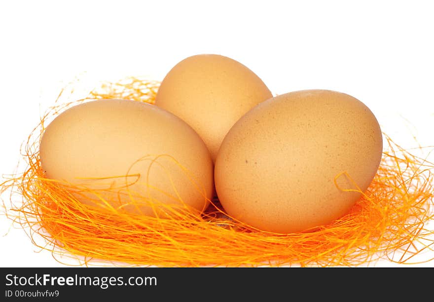 Easter eggs on hay isolated