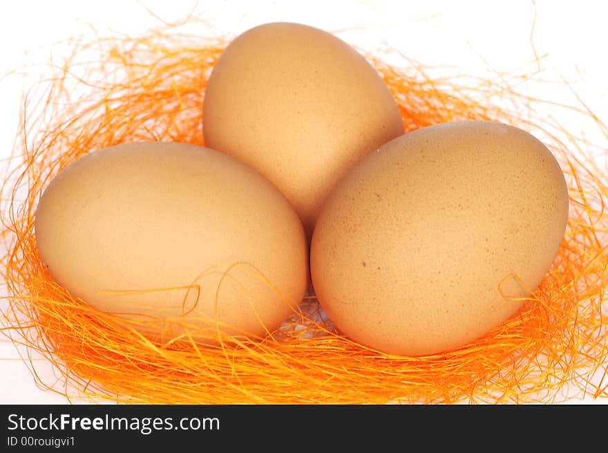 Easter eggs on hay isolated