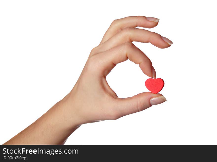 Hand holding little red heart.Isolated on white.