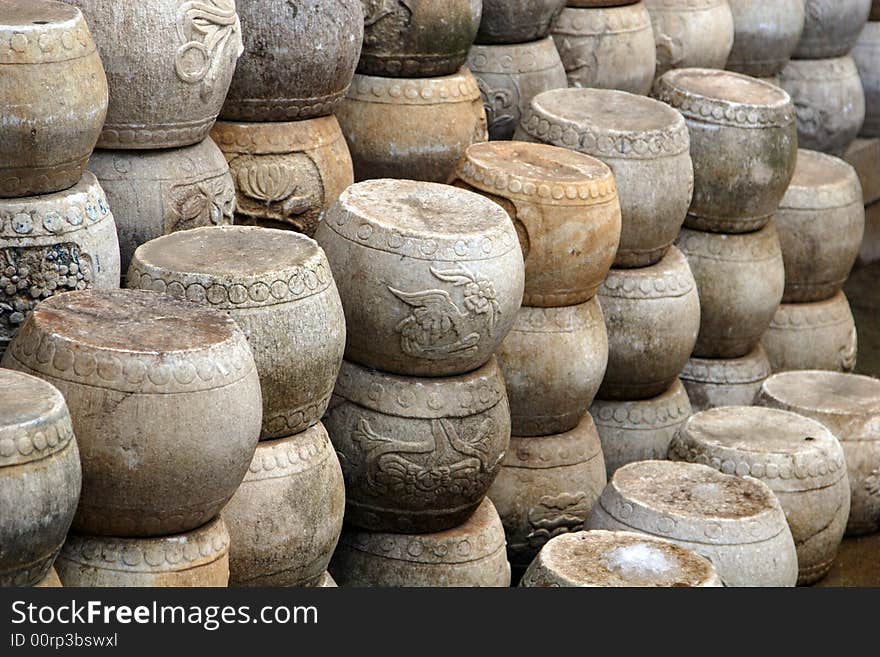 Some stony objects, maybe some drums with various decorations on the surface.This picture is taken in Hanshan Temple in Suzhou ,China. Some stony objects, maybe some drums with various decorations on the surface.This picture is taken in Hanshan Temple in Suzhou ,China.