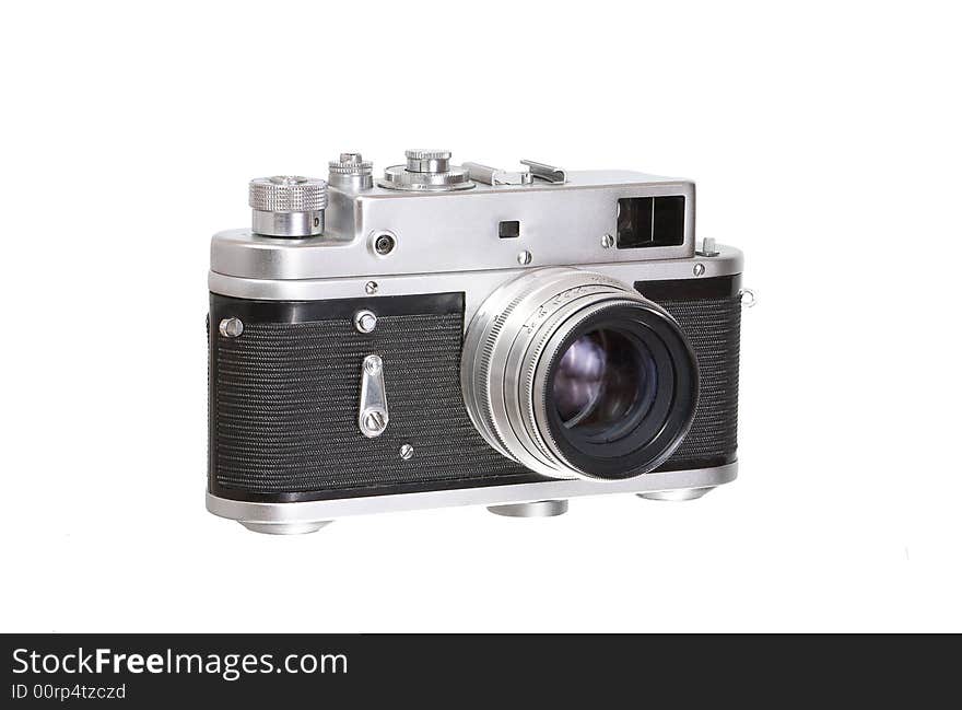 Old photo camera isolated over white