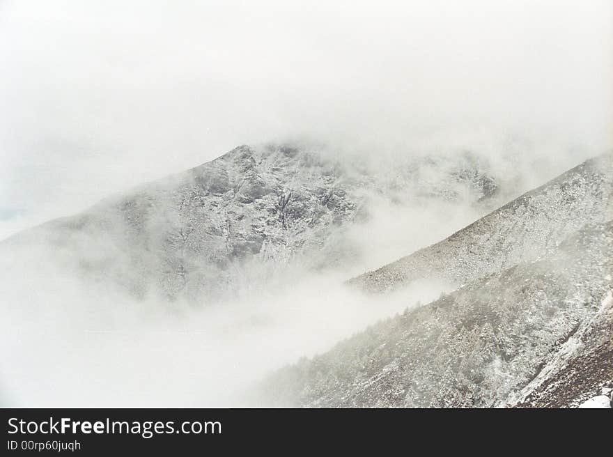 When I climb the summit of Mt.taibai,fog is raising. The huge ridge gleamingly. no ps. photo by Canon Eos 3 kodak 100 scan by Nikon coolscan V ED. When I climb the summit of Mt.taibai,fog is raising. The huge ridge gleamingly. no ps. photo by Canon Eos 3 kodak 100 scan by Nikon coolscan V ED