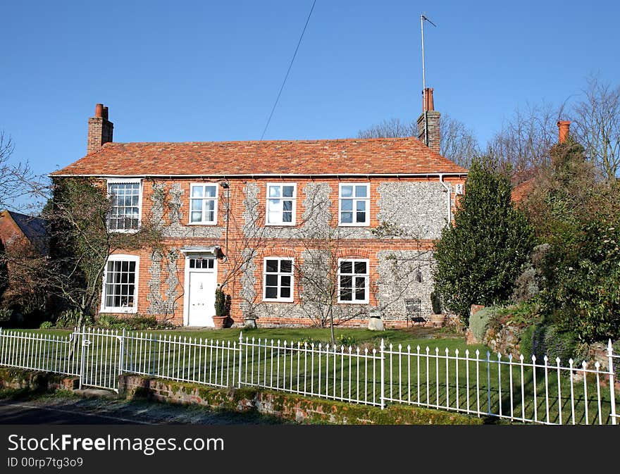 Traditional Brick and Flint English Village House and garden