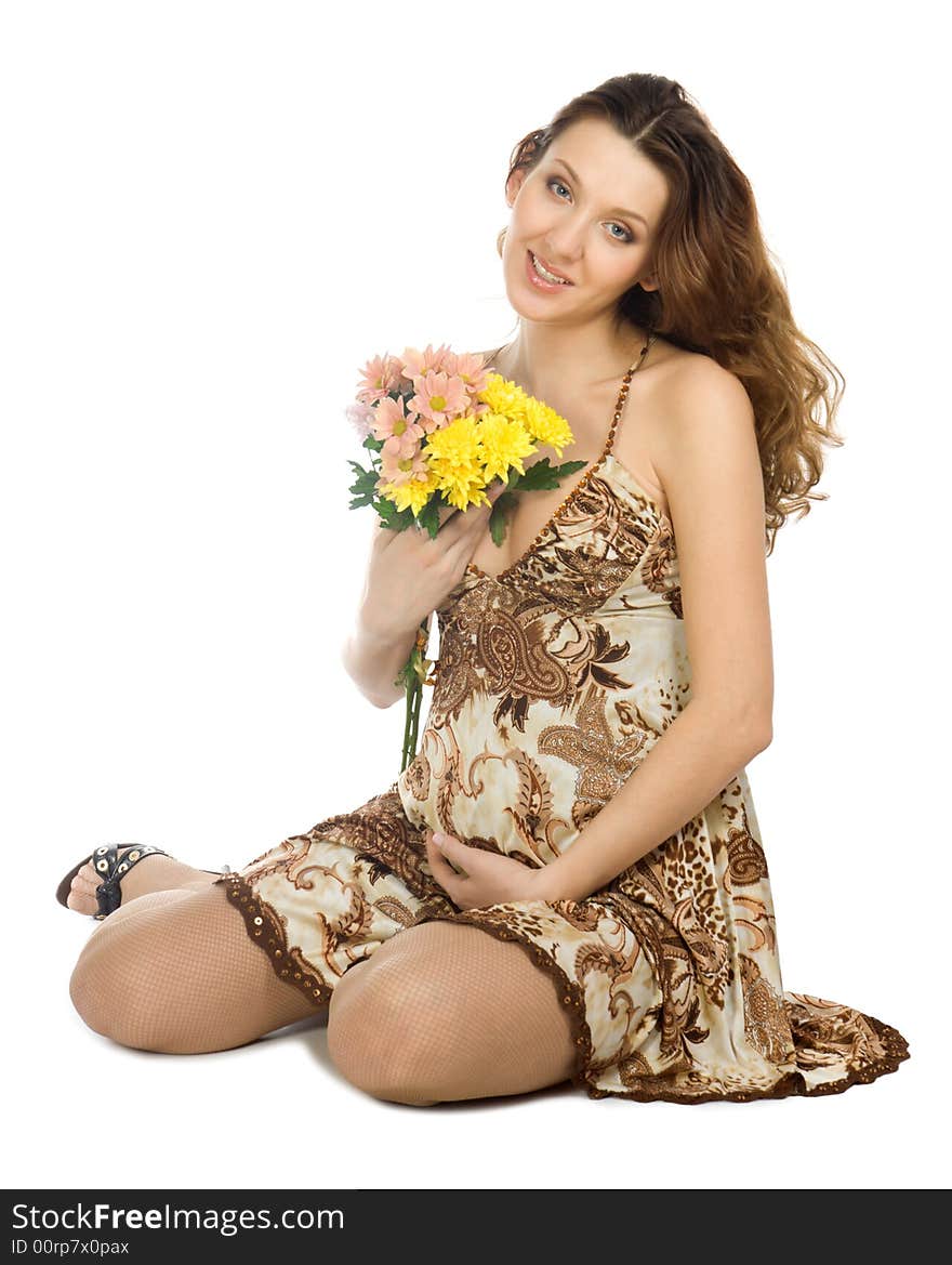 Smiling Pregnant Brunette With Flowers