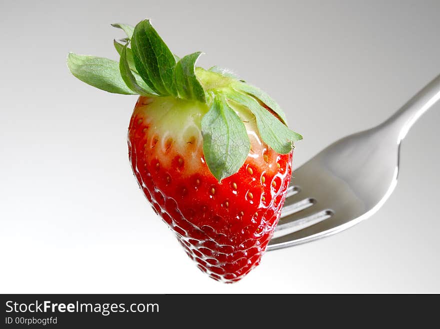 Fresh Strawberry on a fork