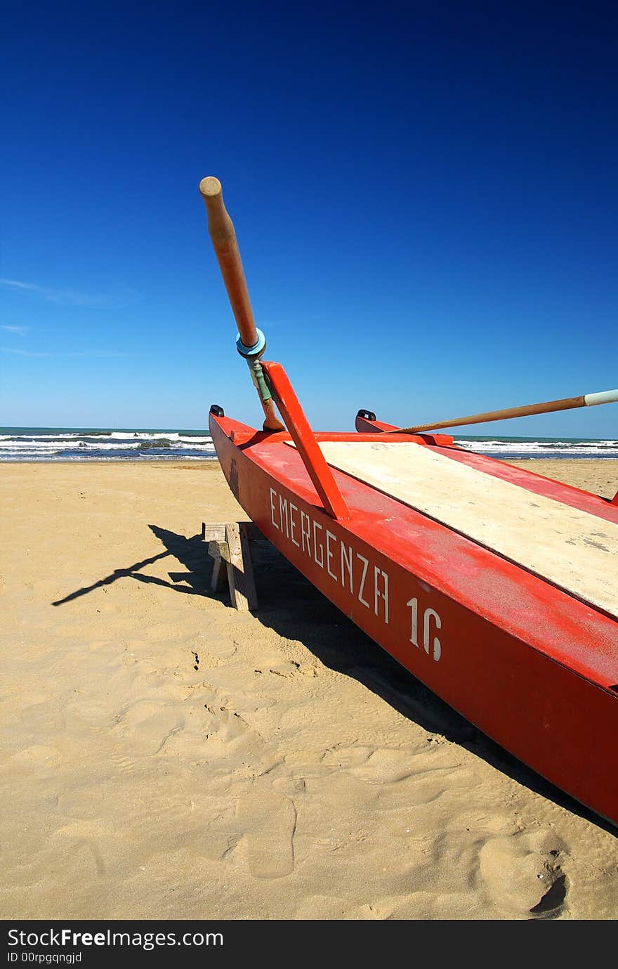 Red boat on the beach