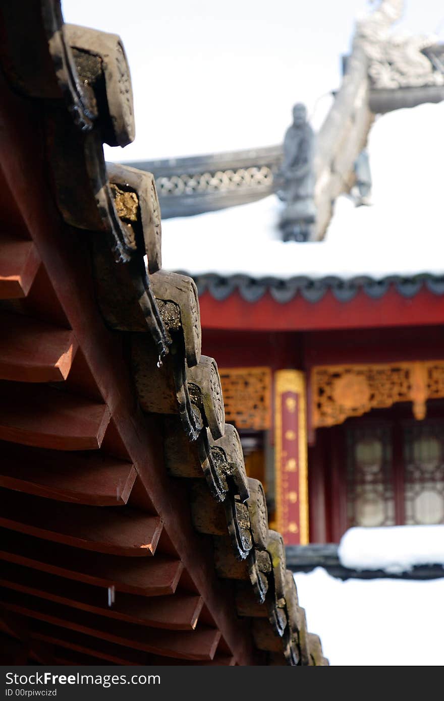 The roof of some ancient houses decoated with snow.This picture is taken in Hanshan Temple in Suzhou ,China.