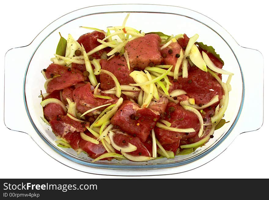 Meat in glass on a white background with path