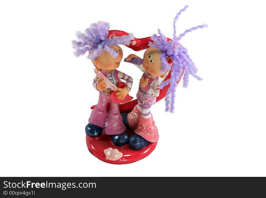 Statuette: A pair of teenagers singing. Statuette: A pair of teenagers singing