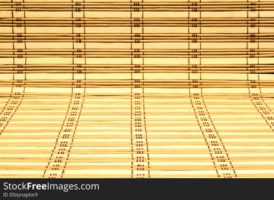 Beautiful background from thin wooden sticks