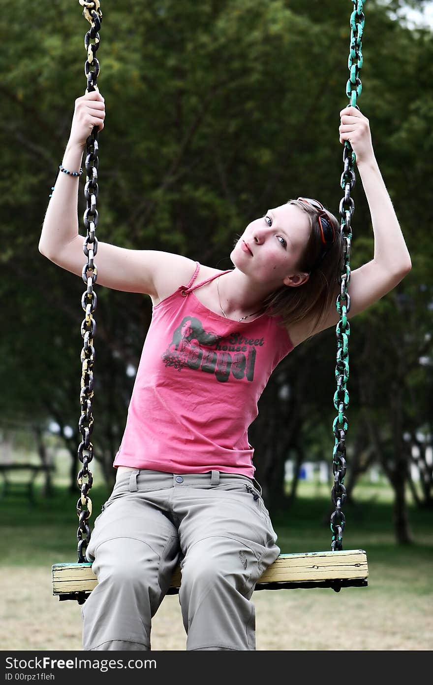 Swinging young girl