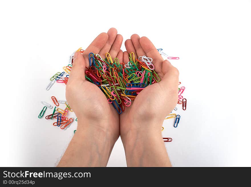 Hands holding paper clips isolated on white