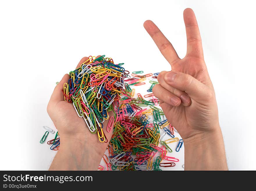 Hands holds paper clips and gives gesture isolated on white 4. Hands holds paper clips and gives gesture isolated on white 4