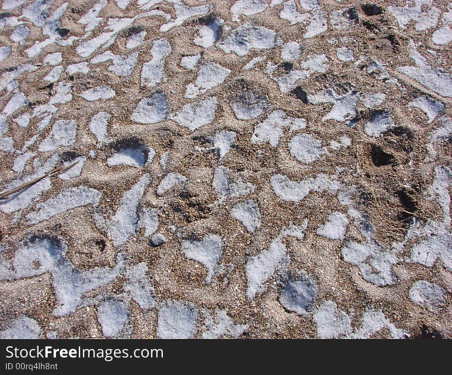 Sand in winter under snow. Sand in winter under snow